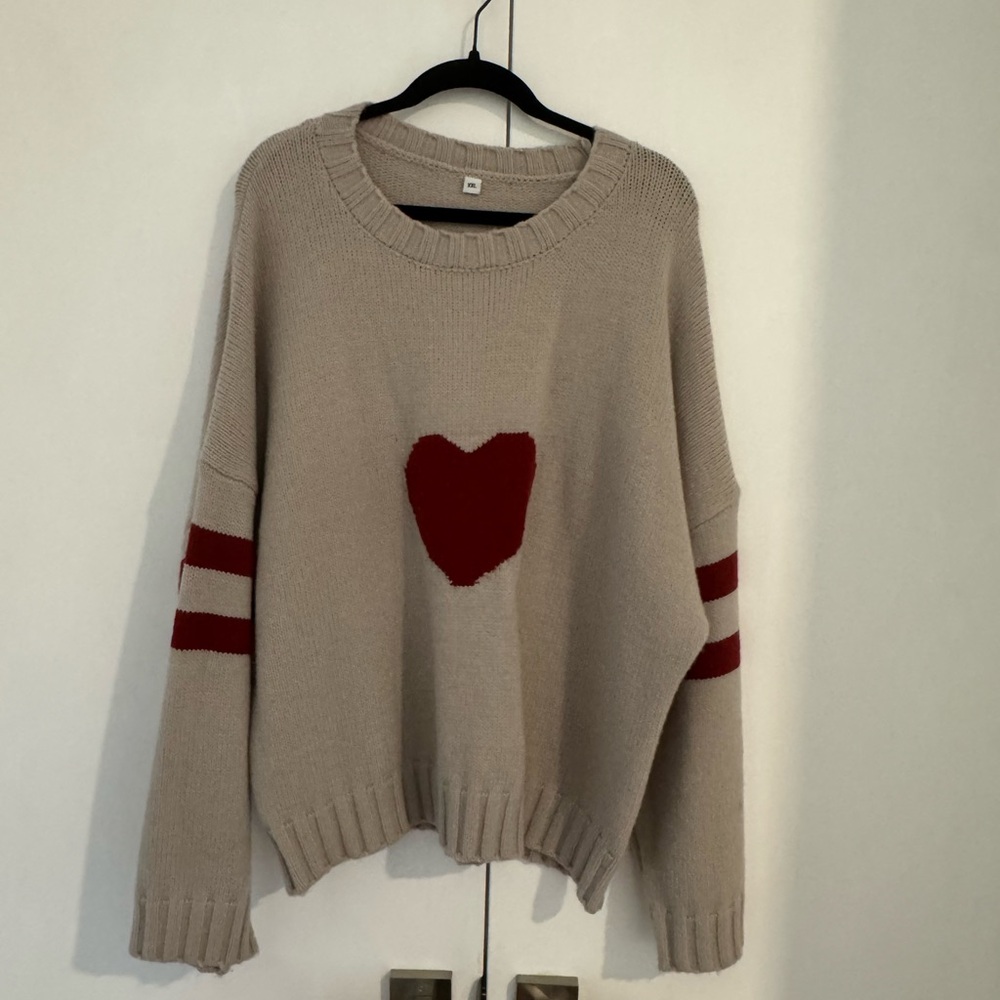 Chic Beige Sweater with Red Heart Accent